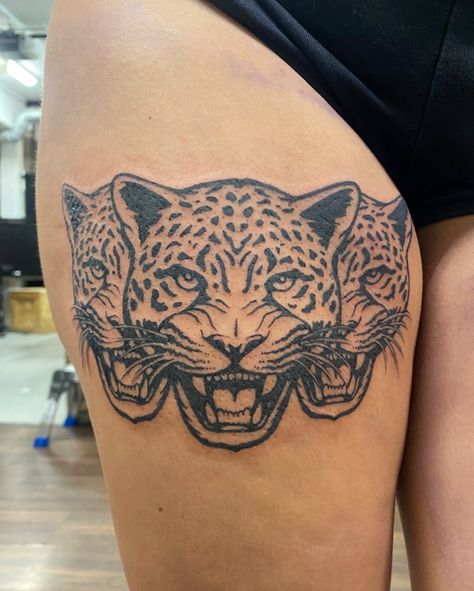 Take a look at @sydneyctattoo's mesmerizing tattoo featuring three feline heads, although it's hard to tell if they're jaguars or leopards. Can you identify which one it is? 🐱⁠ Unique Leopard Tattoo, Angry Leopard Tattoo, Black Jaguar Tattoo For Women, Three Headed Cat Tattoo, Jaguar Face Tattoo, Animal Head Tattoo, Leopard Tattoo Ideas, Feline Tattoo, Snow Leopard Tattoo