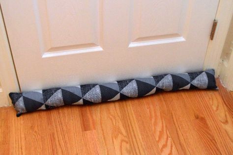 How to Make a Door Draft Stopper | DoItYourself.com Diy Door Snake Draft Stopper, Door Snake Draft Stopper, Draft Stopper Diy, Draft Snake, Homemade Door, Diy Renewable Energy, Draft Blocker, Draught Excluders, Door Draft Stopper