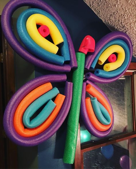 We used pool noodles to create the butterfly from a very hungry caterpillar for my sons 2nd birthday Butterfly Parade Float, Magnified Vbs Decorations, Hungry Caterpillar Trunk Or Treat, Pool Noodle Rainbow, Vbs Magnified, Hungry Caterpillar Games, Hungry Caterpillar Classroom, Diy Noodles, Summer Water Activities