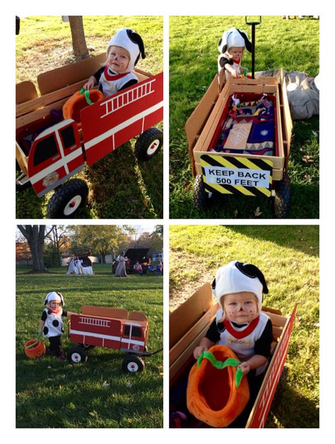 Dalmatian and fire truck costume. I had so many compliments! My husband dressed up as a firefighter and pulled the wagon. Adorable! (I painted the cardboard fire truck and mounted it to our wagon using foam adhesive tape. Bought the puppy costume from Pottery Barn.) Diy Fire Truck Cardboard Wagon, Wagon Turned Into Firetruck, Halloween Fire Truck Wagon, Fire Truck Diy Cardboard Boxes, Fire Truck Wagon Costume, Wagon Fire Truck Halloween, Diy Firetruck Wagon Cardboard, Firetruck Wagon Diy, Wagon Fire Truck Diy