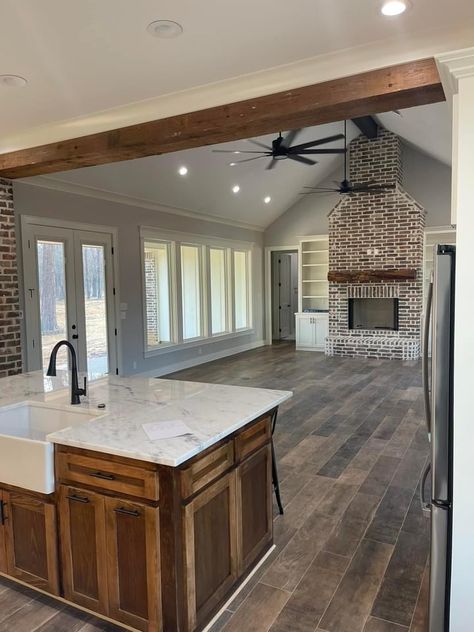 Barndo Open Concept, Open Concept Renovation, Living Room Inspo Open Floor Plan, Barnwood Beams Ceiling, Pitched Living Room Ceiling, Rustic Open Kitchen And Living Room, Barndominium Vaulted Ceiling Ideas, Barndo Vaulted Ceiling, Rancher Living Room Ideas