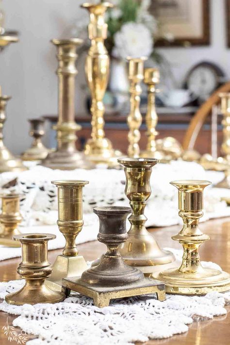 Learn the quick way to identify brass vs. other metals. Tips and tests to show you how to tell if something is brass. How To Decorate With Brass Candlesticks, Decorating With Brass Candlesticks, Brass Vs Gold, Brass Candlesticks Decor, Candle Stick Decor Ideas, How To Polish Brass, Bridal Head Table, Mantle Candlesticks, Candlestick Makeover