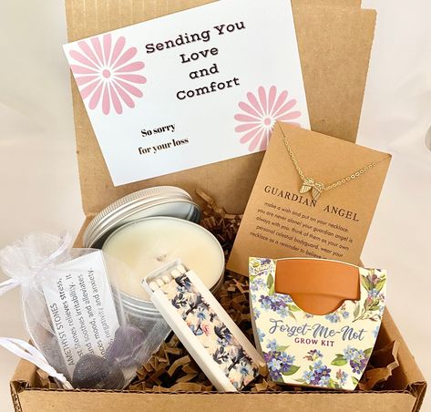 "This gift box will brighten anyone's day! The box includes: 1  3 oz scented candle (choose scent from drop down menu) 1  cute box of matches 1  Mini Grow Kit--Forget Me Nots Healing Crystal with Info on Meaning 1 Angel Wing Necklace 1  card with your personal message Gift comes in a high quality, decorated box.   Please be aware that we ship to the address provided. If this item is being ordered as a gift and is going straight to the recipient, please leave their address in the address section Bereavement Gift Basket, Christian Gift Baskets, Sympathy Basket, Unique Sympathy Gifts, Sympathy Gift Baskets, Care Basket, Condolence Gift, Angel Wing Necklace, Grow Kit