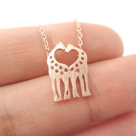 Kissing Giraffe Animal Shaped Silhouette Pendant Necklace in Rose Gold | DOTOLY Giraffe Silhouette, Animal Themed Jewelry, School Jewelry, The Giraffe, A Giraffe, Animal Silhouette, Small Charms, Sell Gold, Themed Jewelry