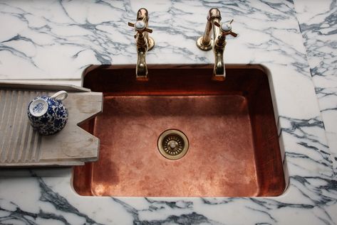 A copper sink is available through kitchen company Plain English when designing a custom kitchen. Photograph from Kitchen of the Week: A Historic Kitchen in Shropshire, Recast in Monochrome Green. Mixed Metals Kitchen, Kitchen Sink Remodel, Plain English Kitchen, Historic Kitchen, Unique Sinks, Copper Kitchen Sink, Mixing Metals, Brass Tap, English Kitchens