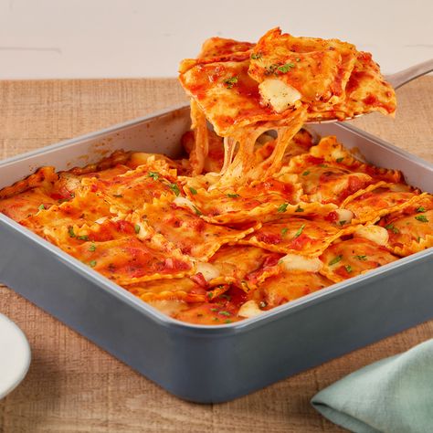 A hearty family-style recipe that combines Chicken Parmesan and Ravioli into one fabulous dish. Ravioli Recipe With Chicken, Chicken Parm Ravioli, Buffalo Chicken Ravioli, Chicken Parmesan Ravioli, Ravioli Chicken Bake, Chicken Ravioli Bake, Chicken Parm Ravioli Bake, Chicken Ravioli Recipe, Chicken Parmesan Ravioli Bake