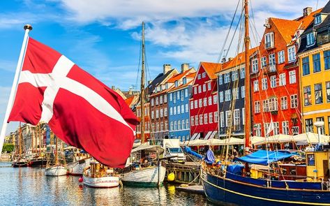 Copenhagen with Denmark Flag Denmark Facts, Denmark Flag, Rich Country, Scandinavian Countries, Countries To Visit, Heathrow, Copenhagen Denmark, Aarhus, Tour Operator