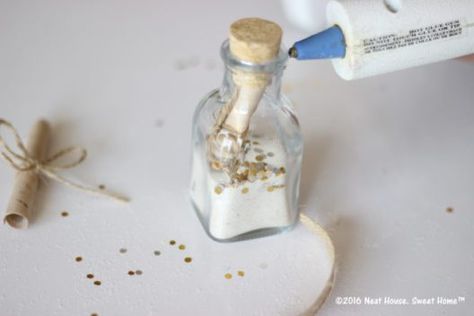 DIY Footprints in the Sand Baptism Favors | An excerpt of this beautiful prayer is tucked inside these miniature glass jars. This is a beautiful keepsake for Baptism, Dedication, and First Communion. Diy Baptism Favors, Baptism Favors Girl, Baptism Party Favors, Footprints In The Sand, First Communion Party, Baby Boy Baptism, Glass Bottles With Corks, Communion Party, Baptism Party