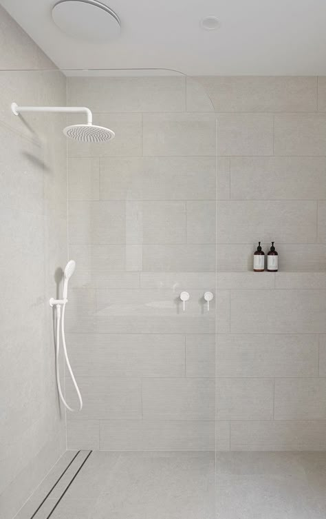 Minimal Grout Bathroom, Big White Tiles Bathroom, Bathroom Reference, Toilet Renovation, Wood Tile Shower, White Shower Tile, Black Tile Bathrooms, Disabled Bathroom, All White Bathroom