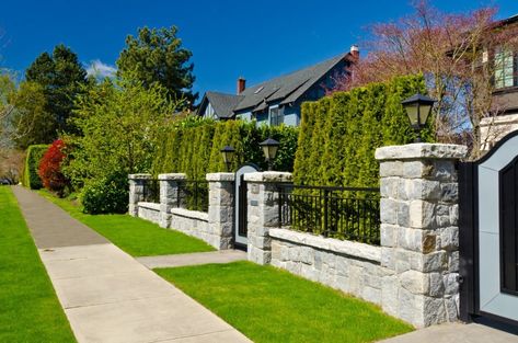 Stone-columns-with-stone-cap Nice Neighborhood, Stone Fence, Fence Planters, Country Fences, Black Fence, Yard Fence, Fence Doors, Fencing Ideas, Concrete Fence