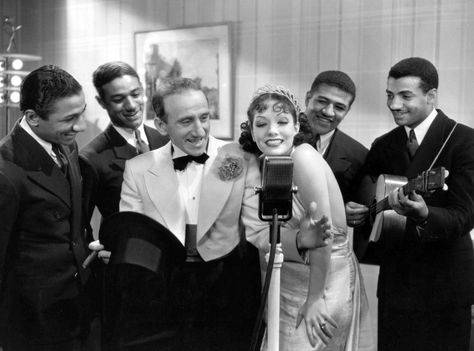 a black and white movie still of Dolores del Rio and actors from 1934 1920s Radio, Mills Brothers, Jimmy Durante, Latino Actors, Lupe Velez, Kenneth Anger, Big Band Jazz, Mixed Race Couple, 1920s Photos