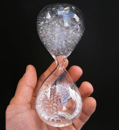 Filled with specially formulated soapy water inside a hand-blown glass hourglass shape, this mesmerizing bubble watch is designed to waste time as the bubbles randomly rise up, not count it down like falling grains of sand would. AKA cool time waster. Funny Gadgets, Hourglass Timer, Sand Clock, Japan Gifts, Hourglasses, Sundials, Sand Timers, Soap Bubbles, Hand Blown