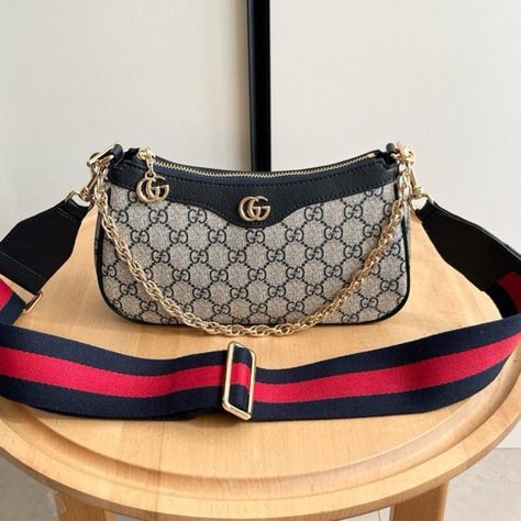 Gucci tote bag in a classic old school canvas design with gold chain and black and red webbing detail for a vintage chic look.
#GUCCI #Vintage chic Gucci Tote Bag, Gucci Vintage, Gucci Tote, Canvas Designs, Women Accessories Bags, Vintage Chic, Chic Look, Gold Chain, Gold Chains