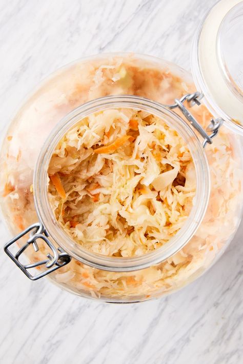 Sauerkraut is a great addition to so many types of meals and is simple to create at home. Homemade sauerkraut ferments over a few days and holds incredible taste while providing great probiotic benefits. Simply using kosher salt and cabbage, this sauerkraut comes together with minimal effort and equipment! | wyseguide.com #sauerkraut #preserving #summer #recipe #fermentation How Do You Make Saurkraut, Fermented Recipes, Make Sauerkraut, Cook Vegetables, Traditional German Food, Fermented Sauerkraut, Sauerkraut Recipe, Metabolic Health, Vegan Probiotics