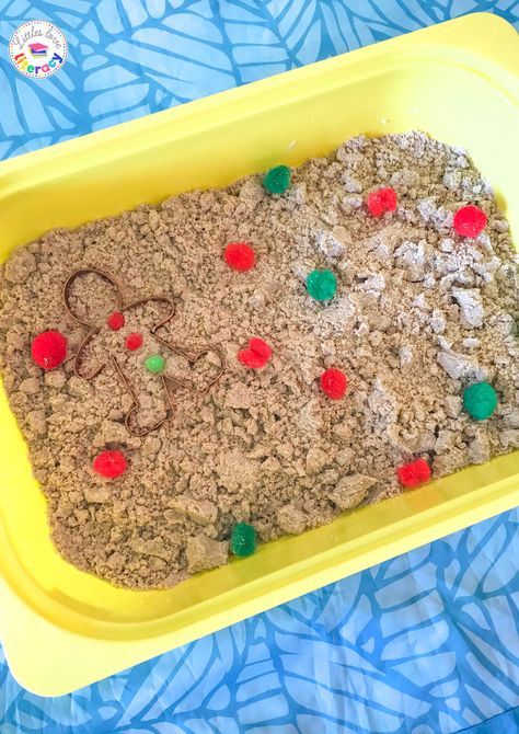 Check out this Gingerbread Sensory Bin that is perfect for preschool, prek, kindergarten, & even toddlers! This sensory bin is made from cloud dough, which is flour & baby oil mixed together! (If you use vegetable oil instead, it becomes edible). This post includes the Gingerbread Cloud Dough recipe, which includes lots of delicious-smelling spices, too! Add this to your list of Christmas sensory bin ideas for your home or early childhood classroom (perfect December DIY!) #littlesloveliteracy Around The World Sensory Bin, Gingerbread Sensory Table, Gingerbread Cloud Dough, Gingerbread Sensory Bin, Gingerbread Sensory, Gingerbread Activities Preschool, Cloud Dough Recipe, Flour Baby, Christmas Sensory Bin