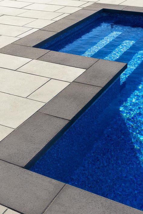 This modern black pool coping design was inspired by the Raffinato Collection! Use these as wall caps for retaining walls, as step treads on your outdoor steps or around pools as a pool coping option! Versatile and available in many alluring colors, this pool coping idea is a great addition to your next landscaping project! Follow us for more inspiration! Modern Yard, Concrete Retaining Wall, Retaining Wall Block, Dipping Pool, Shale Grey, Concrete Retaining Walls, Pool Water Features, Pool Remodel, Pool Landscape Design