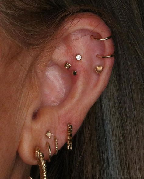 BVLA 💎 Body Vision Los Angeles on Instagram: “Pierced, styled, and new jewelry fittings for Cole by Feather Fingers @tallbitchkata ✨ #julhead #julheadpiercing #bvla #buddhajewelry…” Taurus Constellation Piercing, Earring Placements, Ear Constellation Piercings, Constellation Piercing, Earring Stacks, Constellation Piercings, Body Vision Los Angeles, Unique Ear Piercings, Flat Piercing