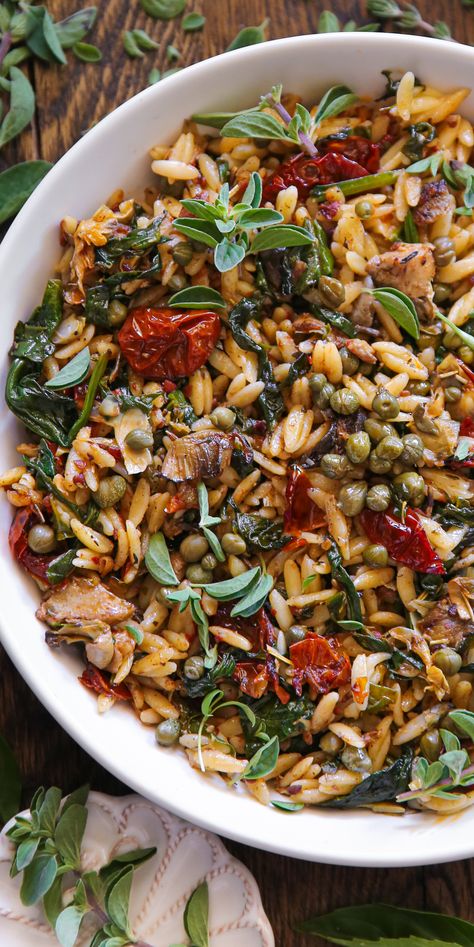 Sun-Dried Tomato Orzo with Spinach, Artichokes, and Capers - in a white bowl. Orzo With Capers, Mediterranean Diet Artichoke Recipes, Winter Orzo Salad Recipes, Healthy Vegetarian Salads, Leftover Orzo Recipes, Recipes For Dinner Healthy Vegetarian, Orzo Recipes Dairy Free, Veg Side Dish, Spinach Mushroom Orzo