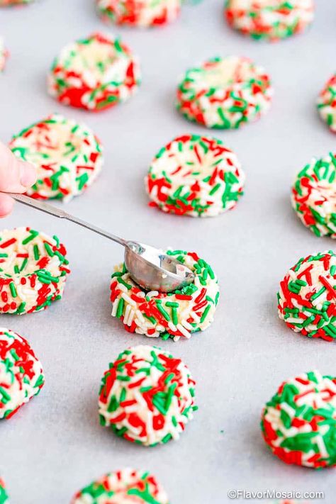 Sprinkle Thumbprint Cookies, Holiday Thumbprint Cookies, Shortbread Cookies Dipped In Chocolate, Sprinkle Christmas Cookies, Grinch Thumbprint Cookies, Kaufman's Thumbprint Cookies, Christmas Cookies Shortbread, Christmas Dessert Recipes Baking, Spritzer Cookies