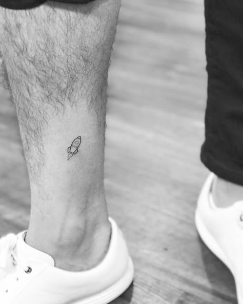 Tattoo Ideas Couples, Ankle Tattoo Cross, Back Of Ankle Tattoo, Rose Tattoo On Ankle, Ankle Tattoo Ideas, Couples Disney, Rocket Tattoo, Lavender Tattoo, Cross Tattoos For Women