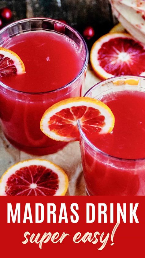 This Madras drink is a simple mix of vodka, cranberry and orange juice; no secret ingredients or complicated techniques. You can prepare it ahead and use a dispenser if making it for a large gathering. The beautiful red hue makes it perfect for holiday parties, Christmas potlucks and dinners. It can easily be transformed into a mocktail. Madras Drink, Madras Cocktail, Drink Dispenser Recipes, Cranberry Vodka Punch, Hannukah Recipes, Vodka Cranberry, Christmas Potluck, Cocktail Vodka, Cranberry Drinks