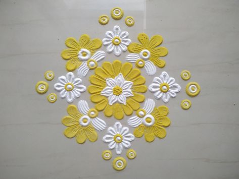 Quick and beautiful rangoli using white and yellow color. #FloorDecoration #SandArt #RangoliDesign #ShradzHappyPlace Yellow And White Rangoli, Yellow Rangoli, Rangoli Making, Colour Rangoli, Rangoli Colours, Floor Decoration, Colorful Rangoli, Simple Rangoli Designs Images, Daily Rangoli