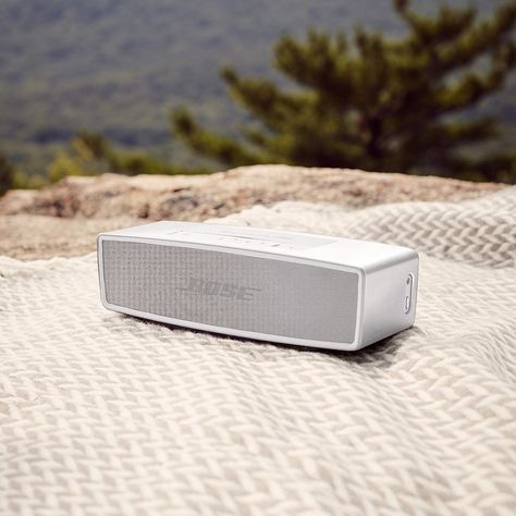 The SoundLink Mini II Special Edition delivers full, natural sound with dramatically deeper bass than you'd expect from a speaker that fits in the palm of your hand. It also features a built-in microphone for taking calls, and makes easy wireless connections anytime, anywhere. Now with 20% more battery life, a USB-C charging port, and two special edition colors. Designed for sleek simplicity, its single-aluminum casing id durable and ultra-compact. Weighing in at just 1.5 pounds. Bose Bluetooth Speaker, Bose Speakers, Video Security, Mini Bluetooth Speaker, Home Audio Speakers, Home Speakers, Voice Assistant, Phone Speaker, Audio Speakers