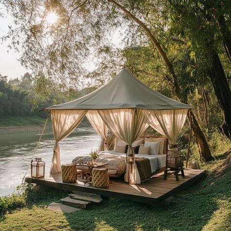 🌿✨ Unwind in Riverside Luxury: Glamping in Thailand’s Lush Forests ✨🌿 Imagine waking up to the soothing sound of a flowing river and the gentle sunlight filtering through a canopy of trees. This luxurious riverside glamping retreat in Thailand is truly breathtaking—a photorealistic scene right out of a dream. 📸 Step into elegance with a spacious tent, featuring a wooden bed framed by soft white curtains, plush sofas under airy canopies, and a cozy outdoor seating area. The setup is complete... Glamping Retreat, Cozy Outdoor Seating, Flowing River, Glamping Resorts, Outdoor Seating Area, Luxury Glamping, Luxury Tents, Cozy Outdoor, Plush Sofa