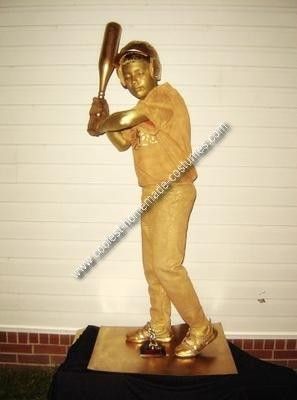 Homemade Baseball Trophy Costume: This Baseball Trophy Costume was so easy and inexpensive to do. I was inspired by my son's baseball trophy.   Supplies for this costume: Gold Spray paint, Sports Trophy Costume, Baseball Trophy Costume, Trophy Costume Halloween, Baseball Furies Costume, Diy Costume Contest Trophy, Gold Spray Paint, Homemade Costumes, Halloween Costumes, Spray