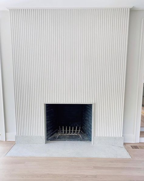 @hilarymattinteriors shared a photo on Instagram: “Fluted Fireplace •” • Jun 24, 2020 at 5:52pm UTC Fluted Wood Panel Fireplace, Transitional Fireplace Ideas, Fluted Fireplace, Fluted Walls, Stone Tile Bathroom, Modern Fireplaces, Fireplace Tiles, Cabin Modern, Fireplace Frame