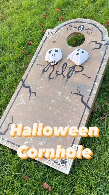 Sassafras Farmhaunts on Instagram: "A spooky take on the classic yard game, our custom #Halloween cornhole set features gravestone boards with skull and ghost beanbags. Aren’t they adorable? 💀👻🪦 Link in bio to the Halloween Cornhole blog." Halloween Cornhole Diy, Halloween Party Outdoor Games, Halloween Cornhole Boards, Old School Halloween Games, Spooky Cornhole, Halloween Corn Hole, Halloween Yard Games, Outdoor Halloween Party Games, Halloween Cornhole