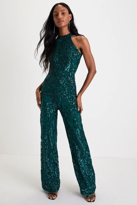 For a look that'll cause some commotion, slip into the Lulus Exceptional Glam Emerald Green Sequin Wide-Leg Halter Jumpsuit! This head-turning jumpsuit has a mesh knit composition, adorned with an intricate sequin design throughout, that shapes a modified halter neckline and a sleeveless bodice. High, fitted waist sits atop wide pant legs that fall to ankle-length hems. Button-loop closures secure atop a U-shaped cutout at the back. Hidden back zipper/clasp. Jumpsuit Fitted, Casual Formal Dresses, Homecoming Outfits, Satin Jumpsuit, Sequin Jumpsuit, Sequin Outfit, Halter Jumpsuit, Lulu Fashion, Sequin Design