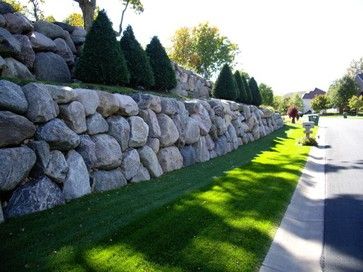 Boulder Retaining Wall modern landscape Landscaping With Boulders On A Slope, Rock Wall Landscape, Natural Stone Retaining Wall, Boulder Retaining Wall, Diy Retaining Wall, Rock Retaining Wall, Retaining Wall Design, Garden Retaining Wall, Stone Retaining Wall