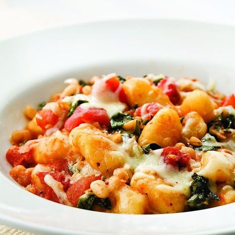 Skillet Gnocchi with Chard & White Beans Recipe | EatingWell Vegetarian Gnocchi Recipes, Dinner Recipes Under 500 Calories, Skillet Gnocchi, Recipes Under 500 Calories, Dinners Under 500 Calories, White Bean Recipes, Gnocchi Recipes, Healthy Meals For Two, Swiss Chard