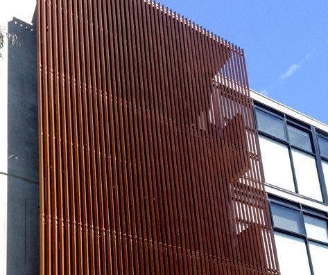 Wood Battens | Knotwood Metal Siding House, Exterior Wall Cladding, Round Building, Wood Facade, Commercial And Office Architecture, Aluminium Cladding, Wooden Facade, Architecture Portfolio Design, Facade Cladding