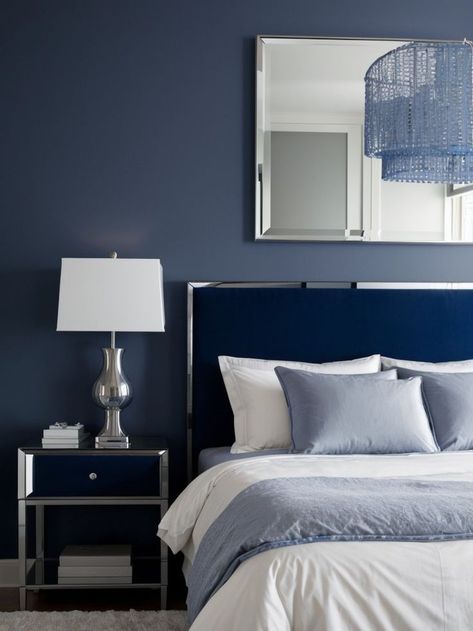 Transform your bedroom with a touch of elegance by creating a captivating accent wall in royal blue and grey. Add a sleek silver mirror and matching lamps for a sophisticated and modern vibe that complements the color scheme perfectly. Royal Blue And Grey Bedroom, Blue And Grey Bedroom, Matching Lamps, Grey Bedroom, Silver Mirror, Blue And Grey, Modern Vibe, Silver Mirrors, House Inspo