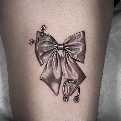 Pierced satin bow from my flash ! Thanks so much 🎀⛓️ #pdxtattoo #chrometattoo #bowtattoo | Instagram Gothic Garter Tattoo, 90s Tattoos Grunge, Cute Bow Tattoos Girly, Bow Tattoo Back Of Arm, Stomach Cover Up Tattoos, Vampy Tattoo, Gothic Bow Tattoo, Spikey Tattoos, Cowbell Tattoo