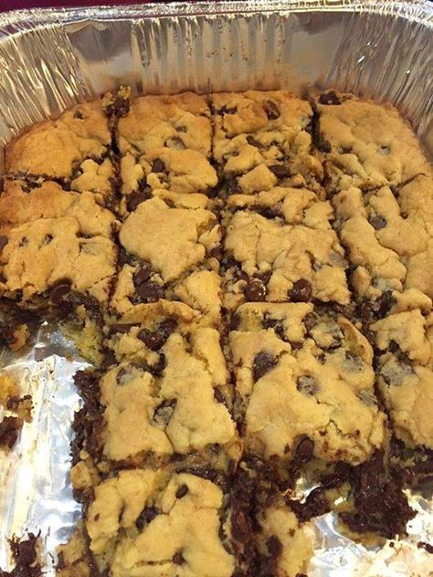 Lazy Chocolate Chip Cookie Bars 1 stick of butter 2 eggs 1 yellow cake mix 1 bag of semi-sweet chocolate chips How to make it 1. Melt butter in bowl 2. Whisk together with eggs 3. Stir in cake mix 4. Mix in chocolate chips 5. Press into greased pan 6. Bake at 350– 9×13 for 20 min, smaller pans 25-28 min. Please say something when you see the recipe! Saying ANYthing is good, it helps you continue seeing my posts! Thank you! Lazy Chocolate Chip Cookie Bars, Lazy Cake Cookies, Lazy Cake, Chocolate Chip Bars, Chocolate Chip Cookie Cake, Easy Chocolate Chip Cookies, Chocolate Chip Cookie Bars, Cookie Bar Recipes, Yellow Cake