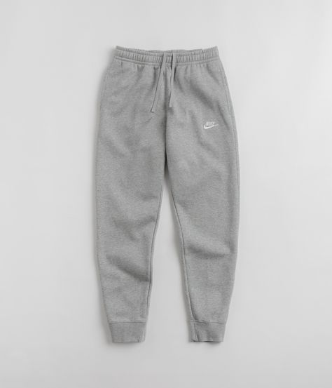 Description Nike Club Fleece Joggers Nike Club Fleece Joggers in Dark Grey Heather, Matte Silver and White. Regular fitting and made from a cotton-polyester blend, these Nike joggers are styled with a brushed fleece lining and an adjustable drawstring waist. Featuring a tapered leg cut and rib knit cuffs, these dark grey Nike Club sweatpants are finished with two side pockets, a single rear pocket and with an embroidered Futura Swoosh logo. Known for their do-more, go-further attitude and for their admiration for sporting progression, Nike is an influential brand that strives to create a sense of community and connection between like-minded individuals. Renamed after the Greek Goddess of Victory and supported by their Nike SB and Nike ACG subdivisions, Nike is a visionary brand that contin Sweatpants Dark Grey, Joggings Nike, Grey Sweatpants Nike, Nike Sweatpants Outfit, Nike Sweatpants Men, Gray Sweatpants Man, Gray Nike Sweatpants, Nike Hose, Grey Nike Sweats