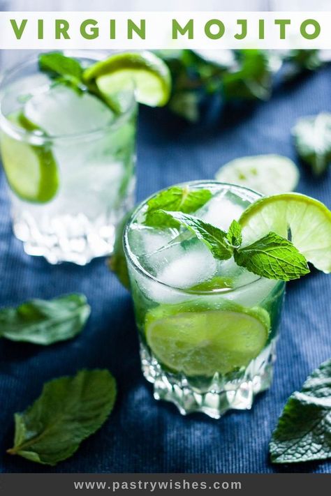 two glasses filled with virgin mojito drinks, lime slices, mint leaves, and ice Mojito Recipe With Sprite, Simple Mojito Recipe, Virgin Mojito Recipe, Drinks With Sprite, Easy Mojito, Easy Mojito Recipe, Cocktail Party Drinks, Alcoholic Punch Recipes, Mojito Mocktail