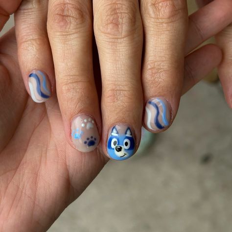 I’m so proud of these, I’m screaming😭 her son’s birthday party was this weekend, can you guess what the theme was??😉💙✨ . #nails #nailday #nailartdesign #nailinspo #nailinspiration #bluey #blueynails #birthdaynails #nailsnailsnails #michigannails Bluey Bingo Nail Art, Bluey Bingo Inspired Nails, Bluey Nail Art Designs, Bluey Nails Ideas, Bluey Themed Nails, Bluey Nail Ideas For Kids, Bluey Nail Design, Bluey Cartoon Acrylic Nails, Bluey Nails Cartoon