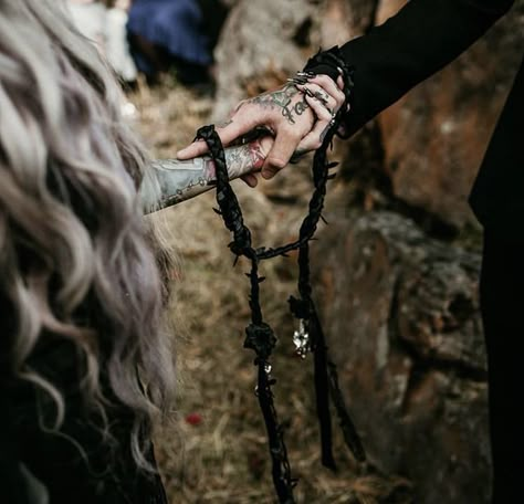 Witchy Wedding Bridesmaid, Witch Core Wedding, Salem Wedding Ideas, Handfasting Pictures, Handfasting Aesthetic, Gothic Wedding Vows, Witch Marriage, Dark Cottage Core Wedding, Spooky Wedding Photos