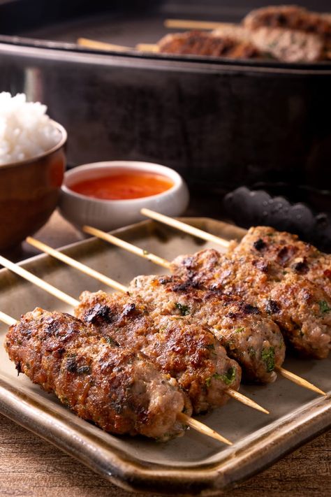 Moo Ping (Thai Pork Skewers) Recipe | Cozymeal Moo Ping, Thai Pork, Pork Skewers, Minced Pork, Gluten Free Chili, Skewer Recipes, Bamboo Skewers, Sweet Chili Sauce, Crushed Garlic