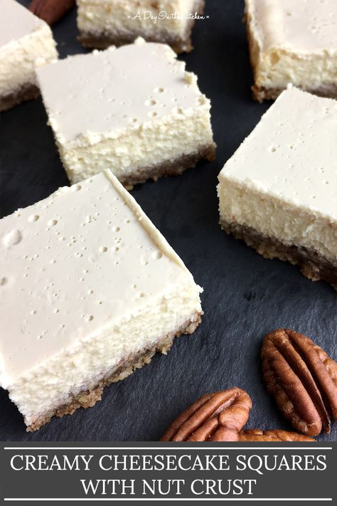 If you're looking for a deliciously creamy gluten-free dessert, look on further than these Creamy Cheesecake Squares. They are made with a nut crust and are totally delish with whipped cream, fruit sauce, or all by themselves! #cheesecake #cheesecakesquares #nutcrust #glutenfree #dessert #cakes Nut Crust For Cheesecake, Quick Cheesecake, Homemade Gluten Free Bread, Recipes Cheese, Cheese Keto, Cheesecake Squares, Cheesecake Crust, Fruit Sauce, Gluten Free Cheesecake