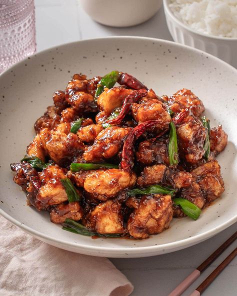 This easy Mongolian chicken recipe features crispy yet tender fried chicken coated in a sweet, spicy and savory sauce that pairs perfectly with a bowl of steamed white rice for a deliciously quick weeknight meal. Mongolian Chicken Recipe, Asian Cusine, Mongolian Chicken, Popular Chinese Dishes, Asian Meals, Wok Cooking, Breakfast Appetizers, Takeout Food, Single Serving Recipes