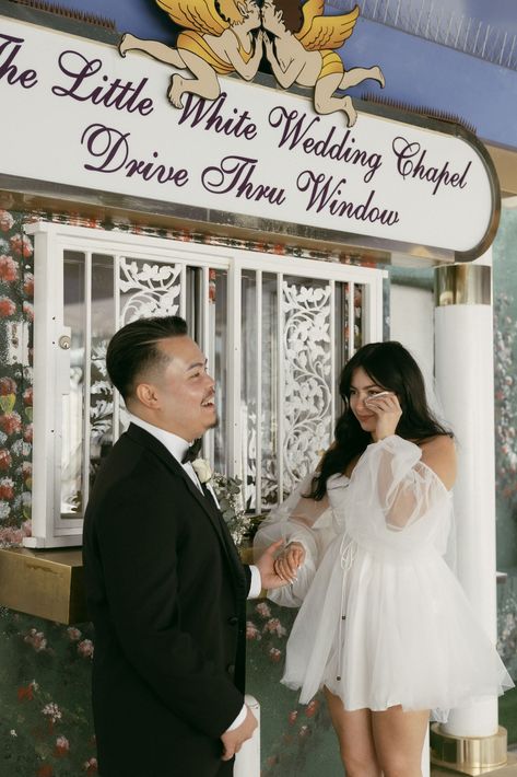 Bride and groom getting married at The Little White Wedding Chapels Drive Thru Window in Las Vegas. Check out this guide which goes over the chapels at LWC, wedding packages, and so much more! Book Bri as your Las Vegas elopement photographer at briannajulianphoto.com! Chapel Photoshoot, Little White Chapel Vegas, Drive Thru Window, Las Vegas Marriage, Little White Chapel Wedding, White Chapel Wedding, White Wedding Chapel, Las Vegas Wedding Chapel, Vegas Wedding Chapel