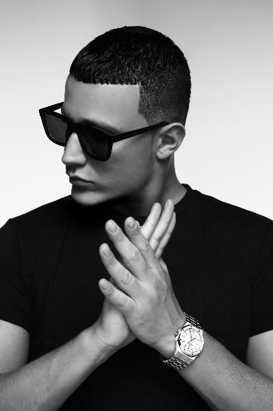 The "Turn Down For What?" producer has done anything but: Since the 2013 5x platinum single DJ Snake has continued to tour the EDM festival circuit, performing at Coachella and EDC Las Vegas. He released "Lean On" with Major Lazer in 2015, which became Spotify's most-streamed song ever. Rapper Photoshoot, Dj Photoshoot, Artist Headshots, Dj Pics, Music Festival Photography, Male Photoshoot, Music Photoshoot, Turn Down For What, Male Portrait Poses