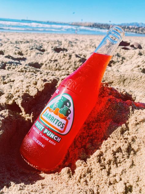 jarrito bottle in the beach sand on a summer day. Mixed Drinks With Jarritos, Mexican Drinks Aesthetic, Jarritos Drinks Aesthetic, Jarritos Drinks, Jarritos Drink Tequila, Beach Drinks Alcohol Pitcher, Fish Aesthetic, Mexican Drinks, Art Assignments