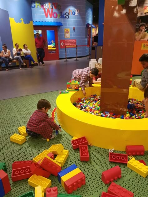 At lego land Lego Center, Lego Play Area, Toy Shop Ideas, Lego Playground, Candy City, Hyderabad Airport, Lego Room Ideas, Playground Idea, Children Play Area