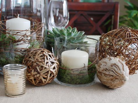 glass hurricanes with candles, moss and grapevine surrounded by potted succulents, votives and twig balls. Moss Balls Decor, Nature Inspired Centerpieces, Diy Candle Centerpieces, African Table, Diy Dining Room Table, Table Centerpieces Diy, Dining Room Centerpiece, Candle Centerpiece, Dining Room Table Centerpieces